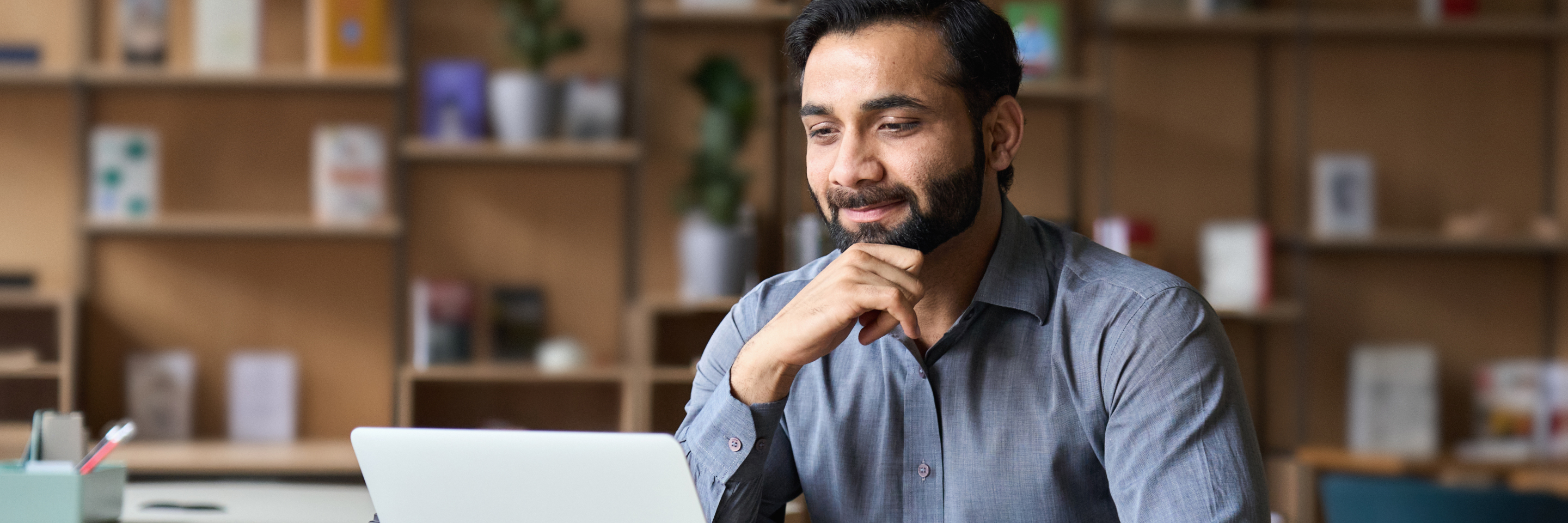 Man reading on computer